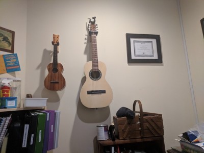 Here in my office, the guitar helps make it my happy place.  <br /><br />The guitar is designed for Silk n' Steel, and really comes alive with a light touch.<br /><br />Also, that is an infill plane in a dental office.