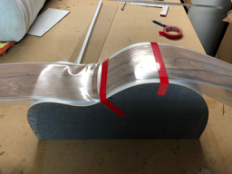 Taping lay up to mould.jpg