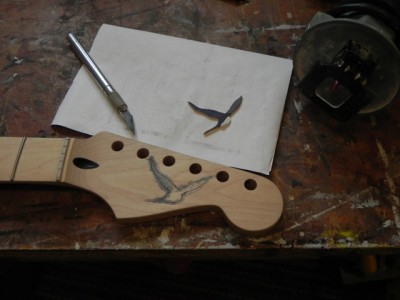 Design for the headstock inlay, based on my fascination with the Purple Martin which spend some time here in the summer.