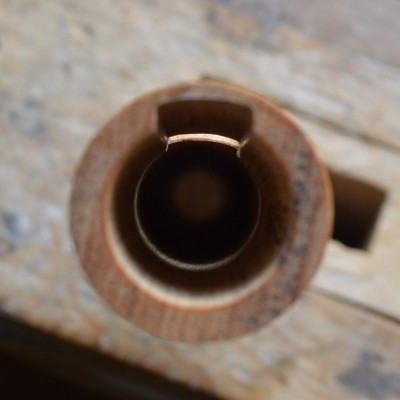 What you should see looking down the barrel. The bottom of the labium is some 0.7-0.8mm lower than the roof of the windway. Obviously, the smaller the instrument, the narrower the gap, the larger, the bigger.